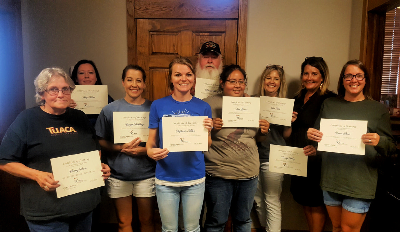 Group of Volunteers with Certificates